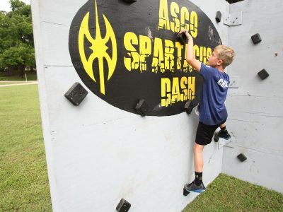 Kid Climbing wall at the AsCO Spartacus Race